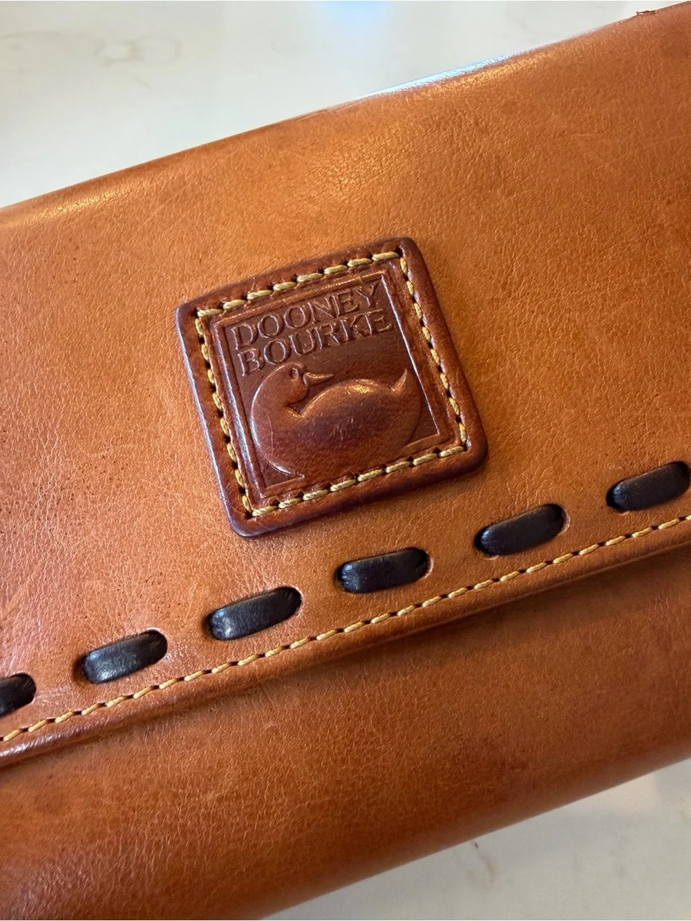 Dooney & Bourke Cognac Leather Tri Fold Wallet with Whipstitch Trim